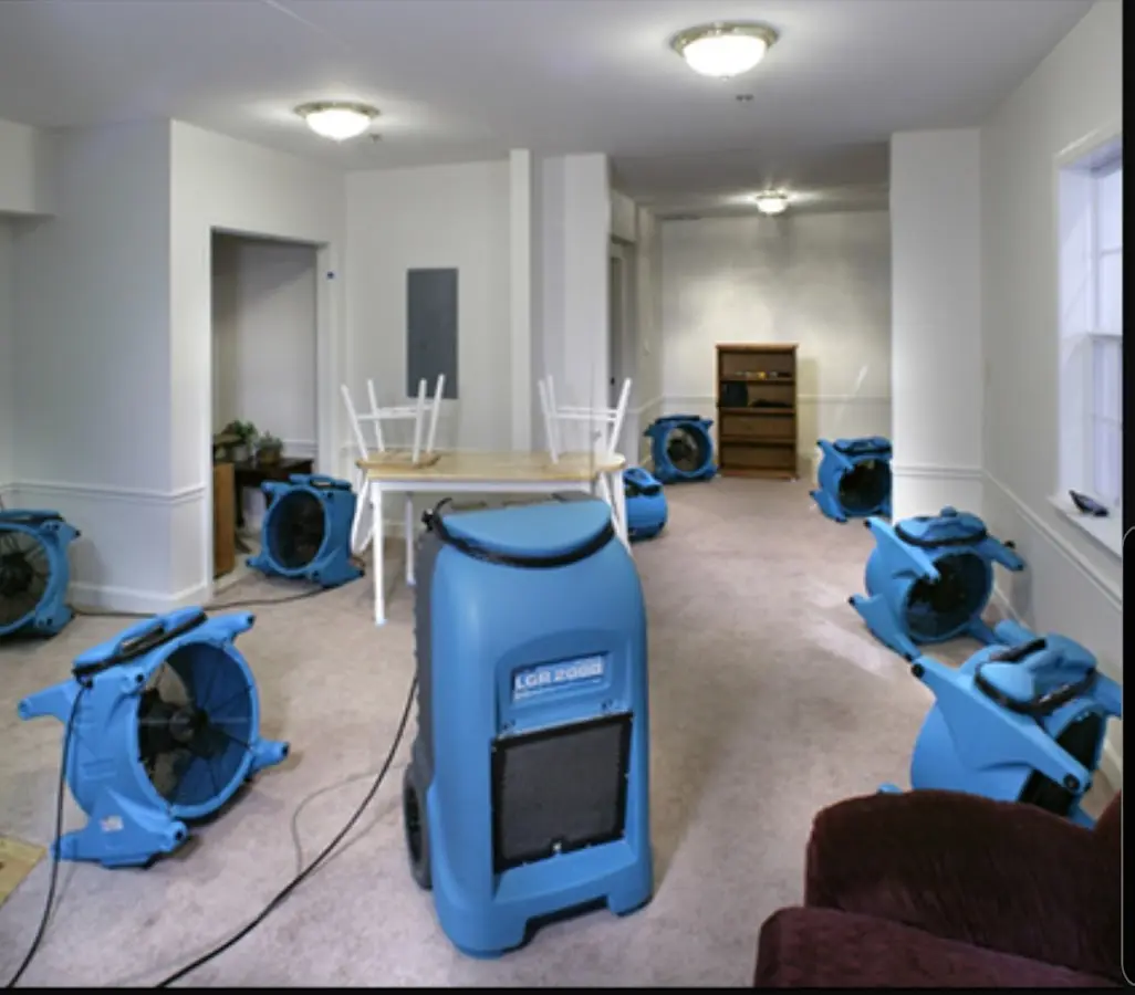 Air movers and dehumidifier setup for Water Damage Restoration in Itasca